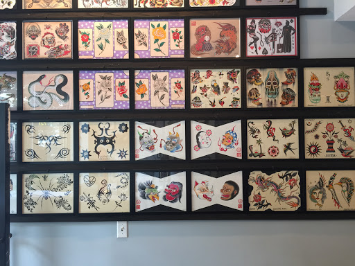 Explore tattoo ideas on ribs for guys, creative tattoo ideas in Brooklyn, available at Electric Anvil Tattoo & Piercing