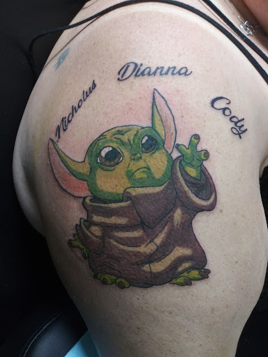 Find fish tattoo ideas for guys for your next unique tattoo in Ocala at Black Lotus Tattoo & Art Gallery Inc