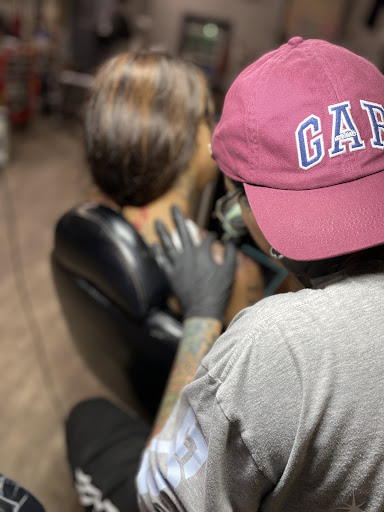 Find music symbol tattoo ideas for your next unique tattoo in Atlanta at Iron Palm Tattoos & Body Piercing Atlanta