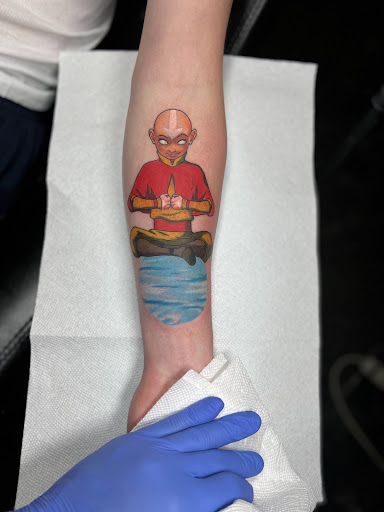 Explore cool chest tattoo ideas for guys, creative tattoo ideas in Milwaukee, available at Planet Artz Tattoo Studio