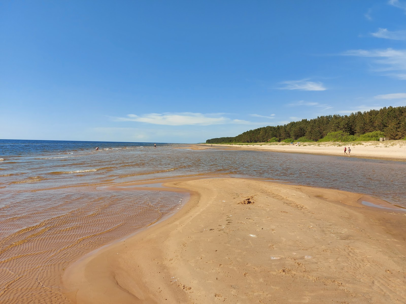 Fotografija Vitrupe pludmale z svetel pesek površino