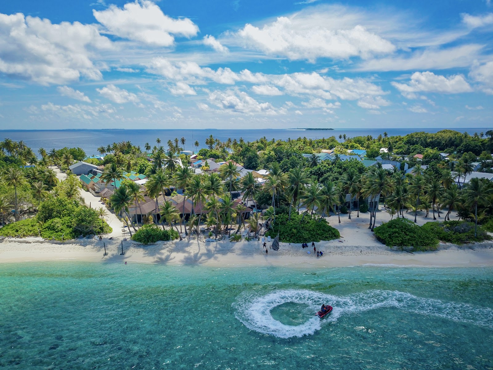 Fodhdhoo Beach'in fotoğrafı geniş bir kıyı şeridi ile birlikte