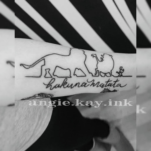 Explore tattoo cross ideas, creative tattoo ideas in Casper, available at Luna & Lotus Amethyst Ink Angie Kay