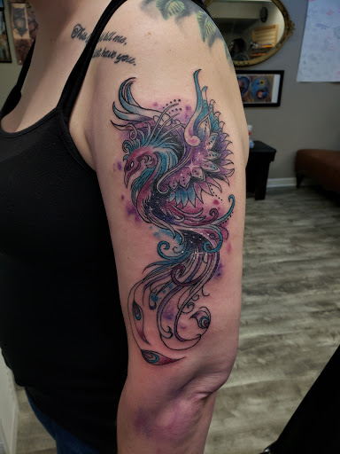 Explore arm tattoo ideas female, creative tattoo ideas in Linn Creek, available at Hillard Skillard Tattoos, LLC.