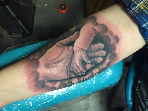 Explore cover up tattoo ideas for guys, creative tattoo ideas in West Lafayette, available at Renegade Tattoo Studio