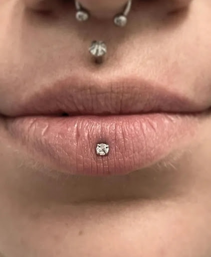 Explore ripped skin tattoo ideas, creative tattoo ideas in Mesa, available at Ranger Tattoo & Piercing