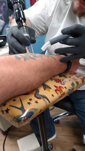 Explore rip tattoo ideas, creative tattoo ideas in Altoona, available at Custom Skin Art