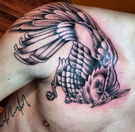 Explore tattoo on shoulder ideas, creative tattoo ideas in Martinsburg, available at 100 Proof Tattoo