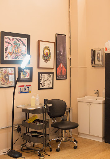 Explore tattoo shop decor ideas, creative tattoo ideas in Covington, available at Illuminaut Tattoo