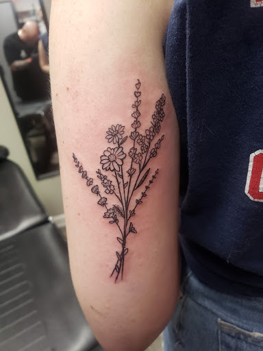 Explore top of the foot tattoo ideas, creative tattoo ideas in Linn Creek, available at Hillard Skillard Tattoos, LLC.