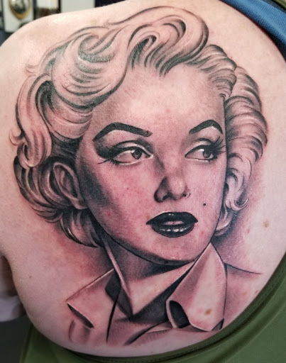 Explore only the strong survive tattoo ideas, creative tattoo ideas in Spokane, available at Anchored Art Tattoo