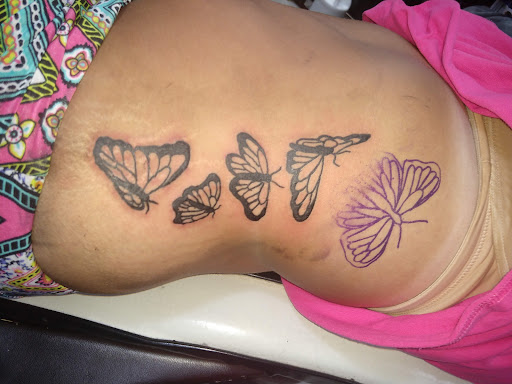 Explore men back tattoo ideas, creative tattoo ideas in Harriman, available at Tattoos By Bryan