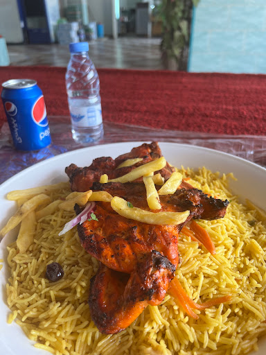 مطعم لذة الشواية البخاري حي الحمراء 