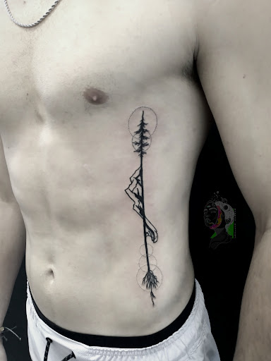 Explore surfboard tattoo ideas, creative tattoo ideas in Cornelius, available at Dermal Designz Tattoo and Piercing Inc.