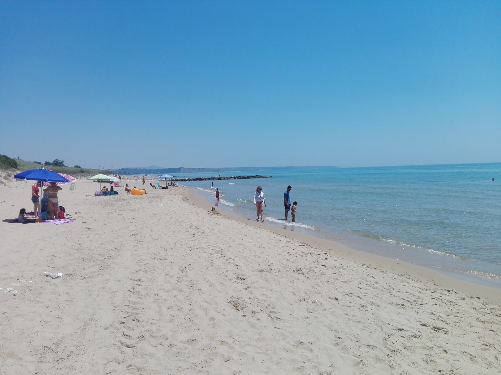 Photo of Porto Palo Beach and the settlement