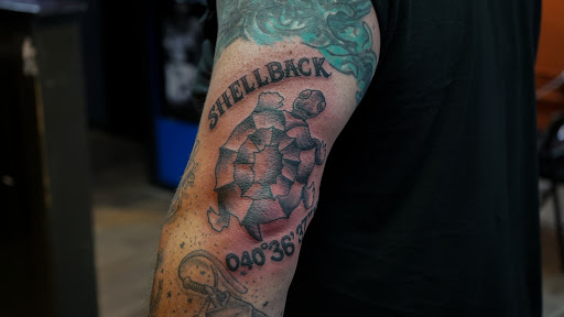 Explore athletic tattoo ideas, creative tattoo ideas in Virginia Beach, available at World Famous Blue Horseshoe Tattoo and Piercing Independence