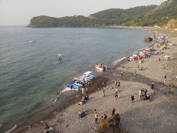 Plage de La Grotte Merveilleuse'in fotoğrafı geniş ile birlikte
