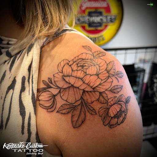 Explore snow tattoo ideas, creative tattoo ideas in Salisbury, available at Keepsake Custom Tattoo & Body Piercing Laser Tattoo Removal