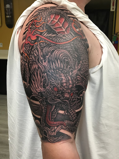 Explore magician tattoo ideas, creative tattoo ideas in Taylor, available at Solid Tattoo LLC