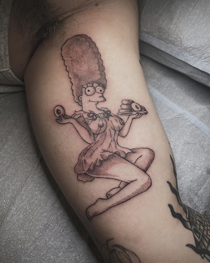 Explore polka trash tattoo ideas, creative tattoo ideas in Portland, available at Rose & Dagger Tattoo