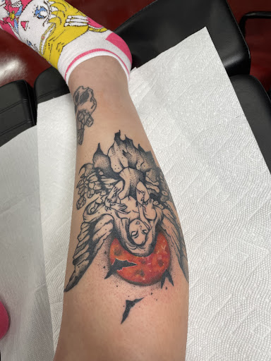 Explore jake the dog tattoo ideas, creative tattoo ideas in Sykesville, available at Red and Blue Tattoo