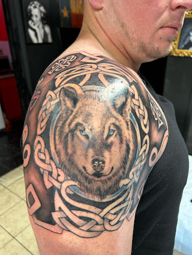 Explore dragon tattoo cover up ideas, creative tattoo ideas in Houston, available at 333 Tattoo Studio HTX
