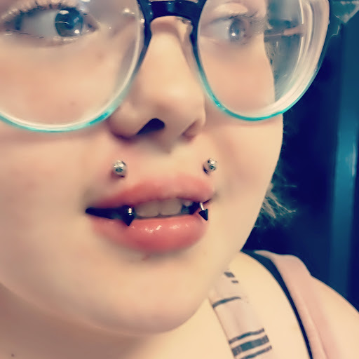 Find palm size tattoo ideas for females for your next unique tattoo in Richland at Poker Face Piercing