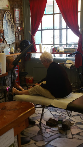 Explore mens angel tattoo ideas, creative tattoo ideas in New Orleans, available at Downtown Tattoos and Piercing