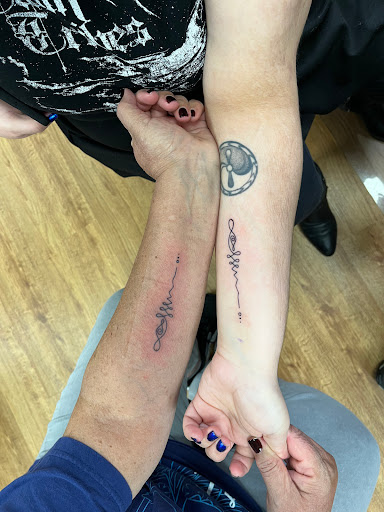 Explore blue flame tattoo ideas, creative tattoo ideas in Wappingers Falls, available at Twin Tides Tattoo
