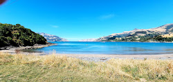 Foto von Wainui Beach mit geräumige küstenlinie