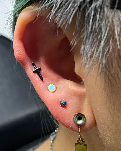 Explore tattoo ideas for womens thigh, creative tattoo ideas in Oswego, available at Bodified