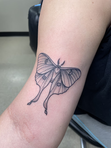 Explore breast cancer ribbon tattoo ideas, creative tattoo ideas in Elkin, available at Black Bear Tattoo