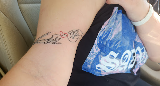 Explore tattoo ideas for losing a loved one, creative tattoo ideas in Foley, available at Symbolic Ink Tattoo Studio