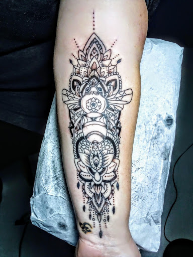 Explore finger tattoo ideas men, creative tattoo ideas in Spencer, available at Inkorporated Body Art