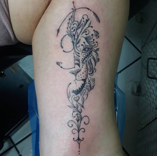 Explore small tattoo ideas behind ear, creative tattoo ideas in Miami, available at Tattoos by Lou Miami - North Miami