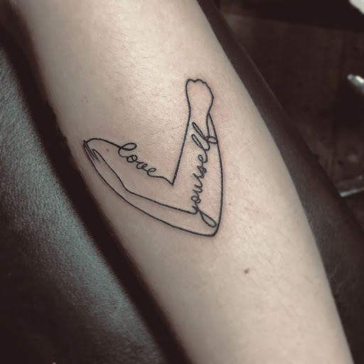 Explore hand tattoo ideas, creative tattoo ideas in Peoria, available at InkCapital Tattoos