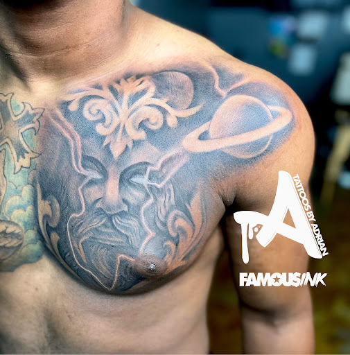 Explore men back tattoos ideas, creative tattoo ideas in Hammond, available at Famous Ink, Inc.