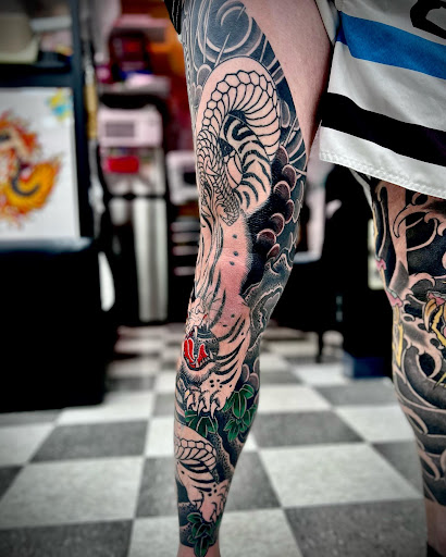 Explore bourbon glass tattoo idea, creative tattoo ideas in Virginia Beach, available at Salt Water Tattoo