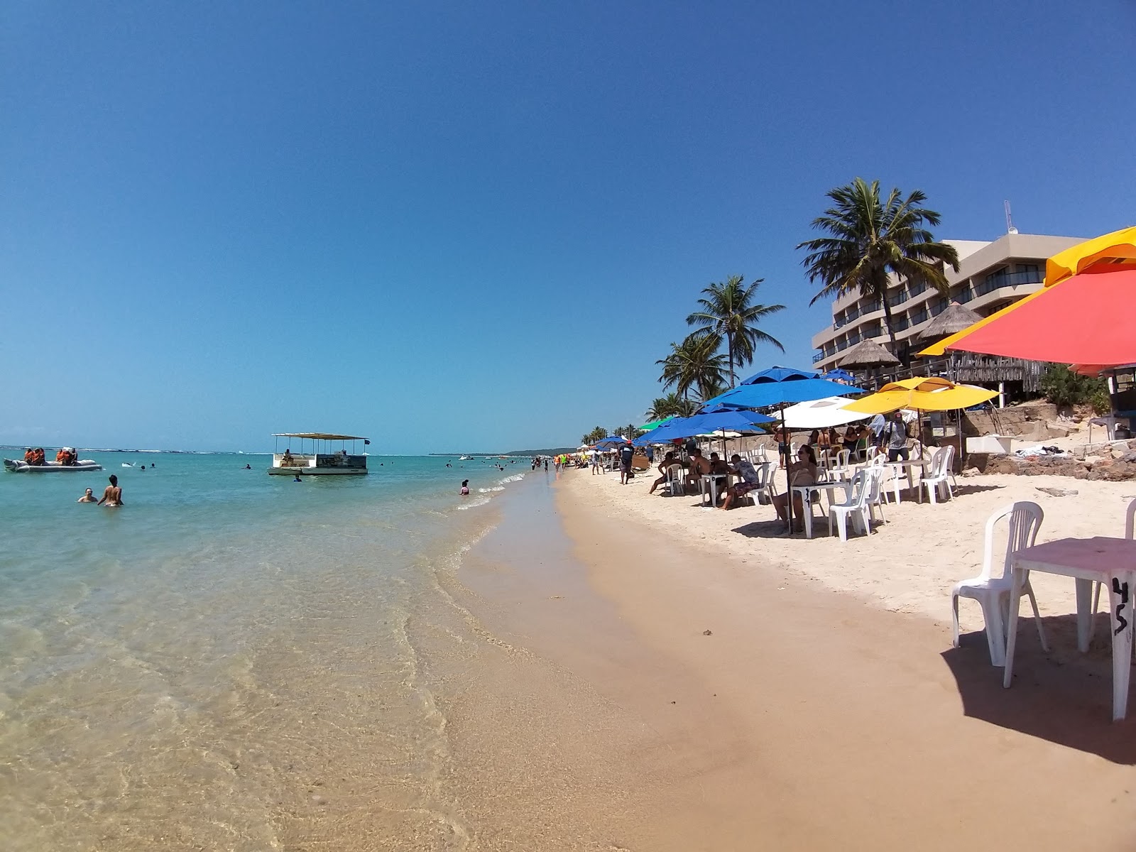 Foto di Praia Niquim con una superficie del sabbia beige