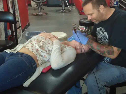 Tattoo Shop «Fat Cat Tattoo Parlour», reviews and photos, 7820 Fair Oaks Blvd, Carmichael, CA 95608, USA