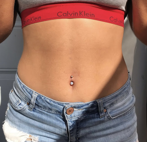 Explore postage stamp tattoo ideas, creative tattoo ideas in San Diego, available at Luna Studio Body Piercings & Tooth gems