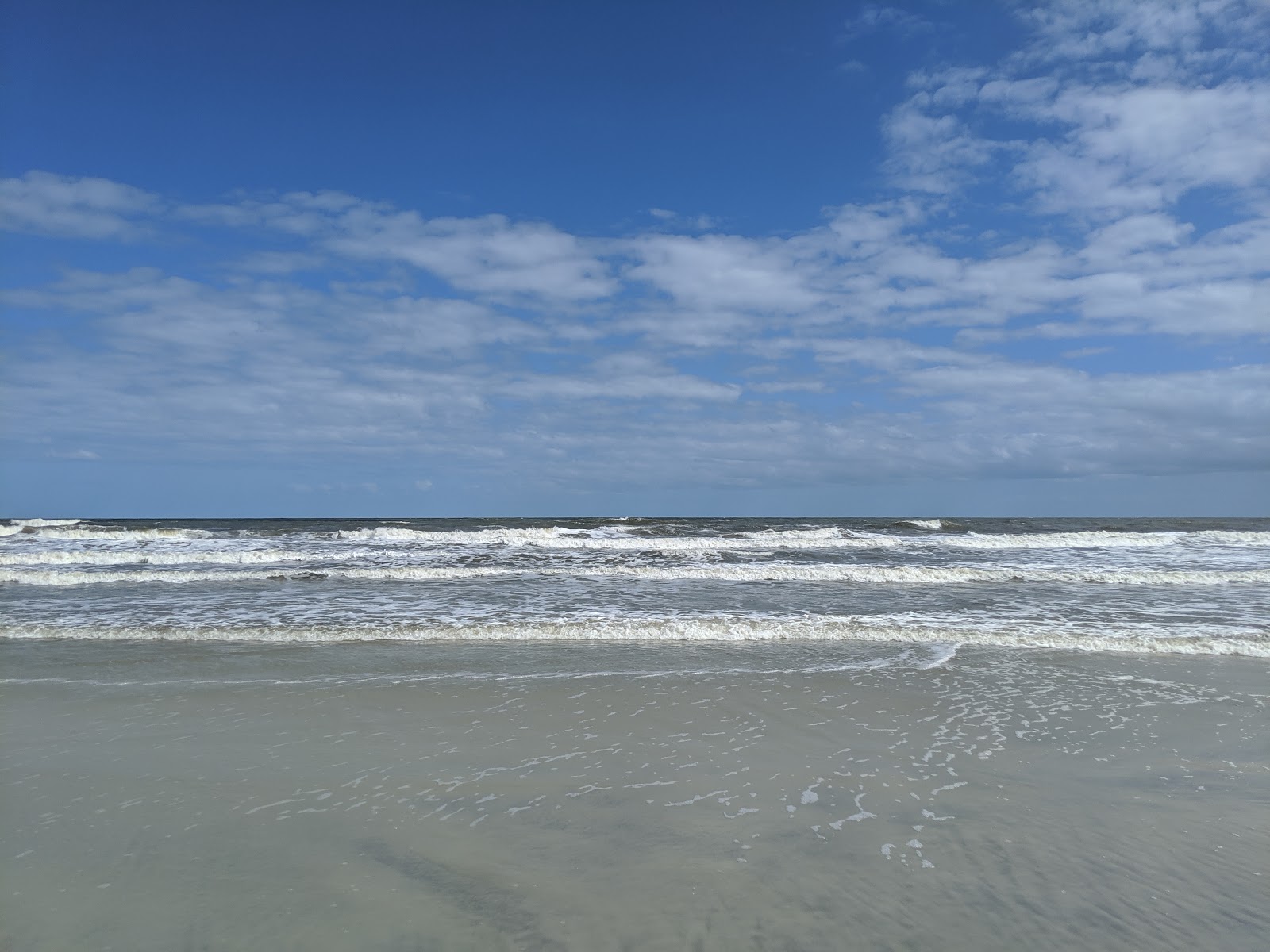 Foto av Stafford beach med turkosa vatten yta