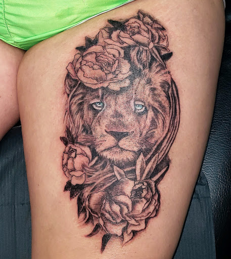 Explore weightlifting tattoo ideas, creative tattoo ideas in Huntsville, available at Kreations Tattoos & Body Piercing