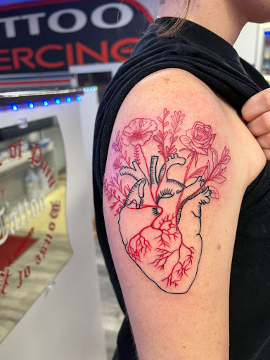 Explore female warrior tattoo ideas, creative tattoo ideas in Rockford, available at House Of Pain Tattoo co.