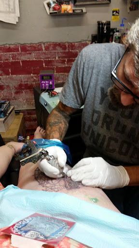 Tattoo Shop «Hall of Tattoos», reviews and photos, 328 E Main St, Norman, OK 73069, USA