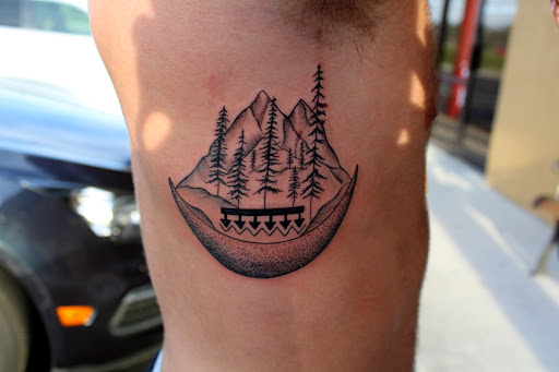 Explore hustler tattoo ideas, creative tattoo ideas in Fort Myers, available at Tiger Lotus Tattoo and Piercing