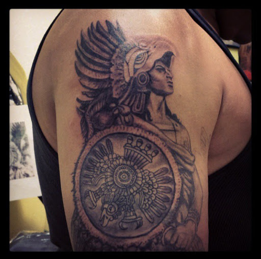Explore last name back tattoo ideas, creative tattoo ideas in San Diego, available at Sideshow Tattoo and Piercing