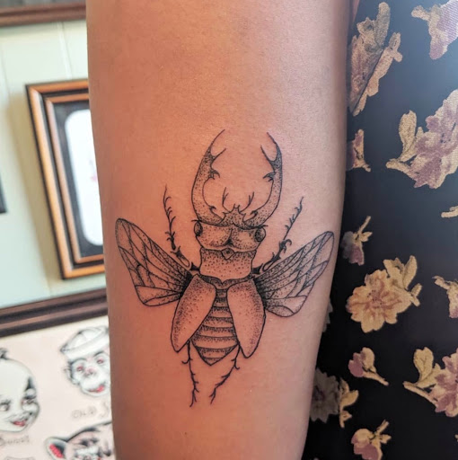 Explore lv tattoo ideas, creative tattoo ideas in Lawrence, available at Standard Electric Tattooing