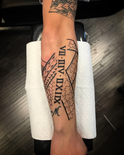 Find baby girl tattoo ideas for your next unique tattoo in Livermore at Legacy Ink Tattoo Parlor