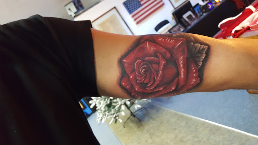 Explore black mamba tattoo ideas, creative tattoo ideas in Crystal River, available at Americas Best Tattoos